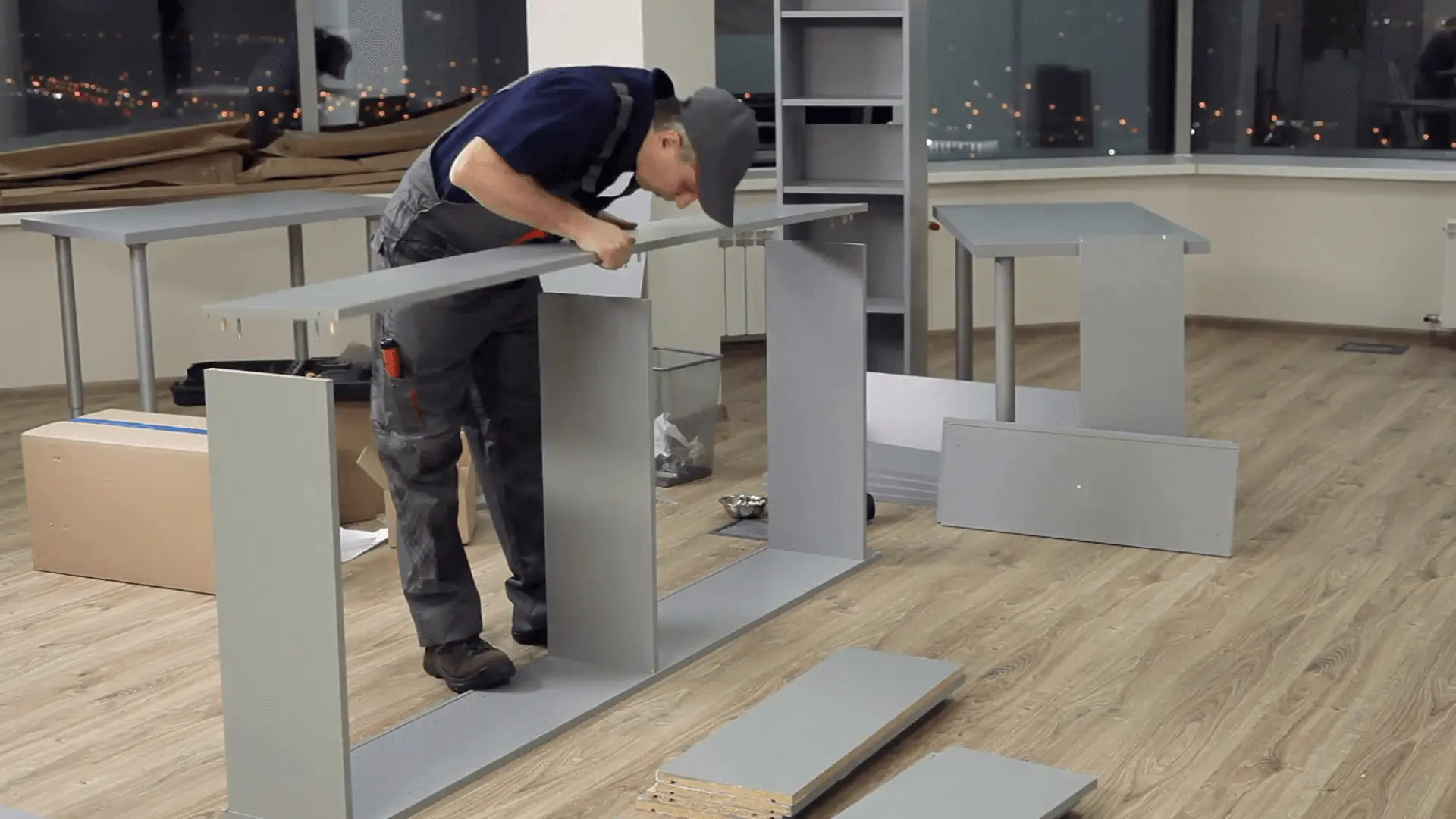 a man is assembling office furniture in orlando fl